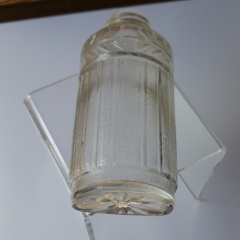 Intricate Clear Glass Bottle